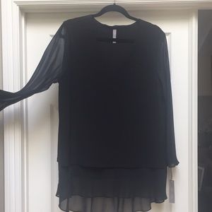 Beautiful sheer blouse with solid lining.